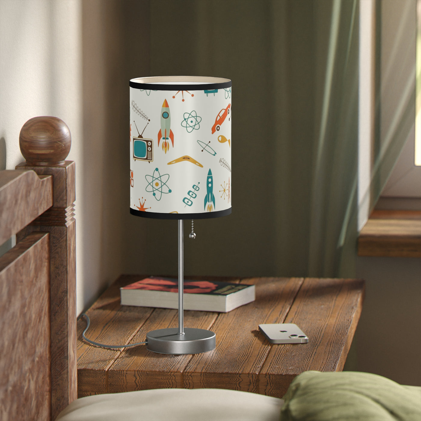Table lamp with a colorful design on a wooden table in a room setting
