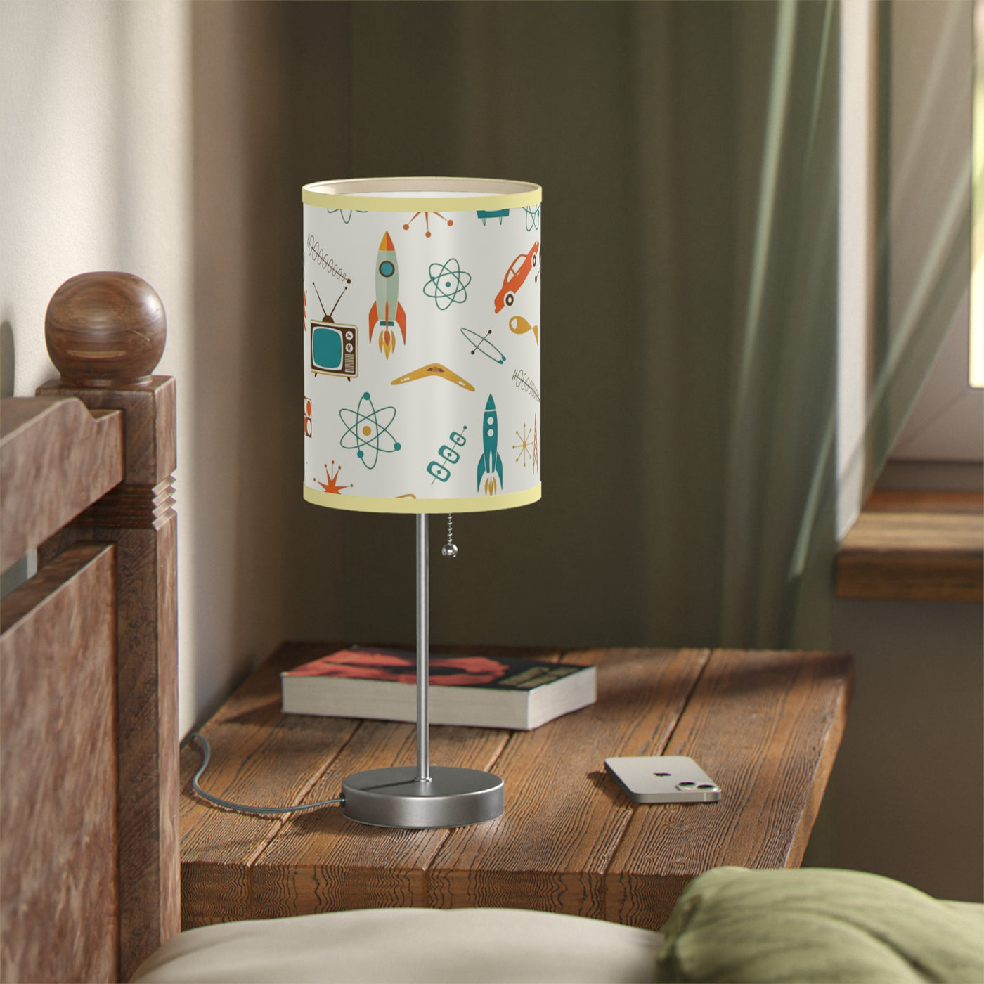 Table lamp with a colorful design on a wooden nightstand in a bedroom setting.