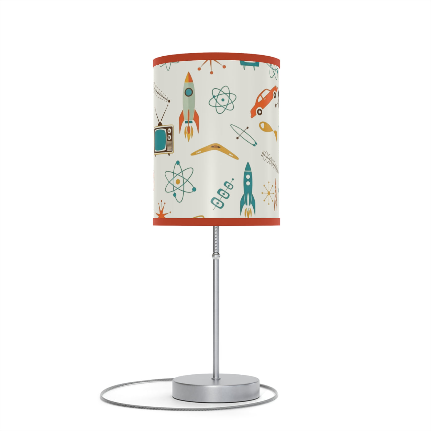 Table lamp with a colorful lampshade featuring space-themed designs on a white background.