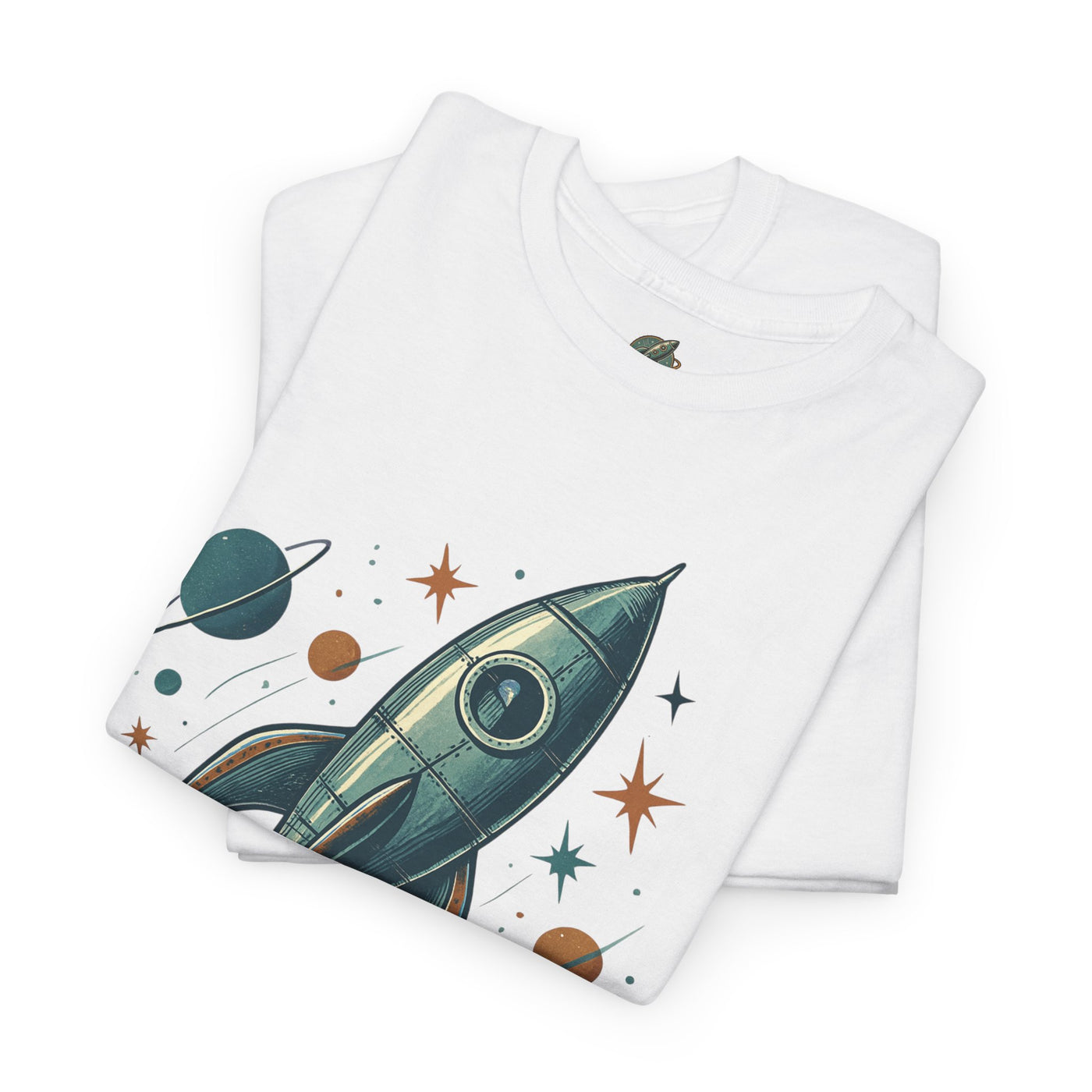 Folded white t-shirt with space-themed design featuring a rocket and planets on a white background