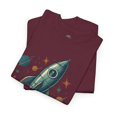 Folded maroon t-shirt with a space-themed design featuring a rocket ship, planets, and stars on a white background.