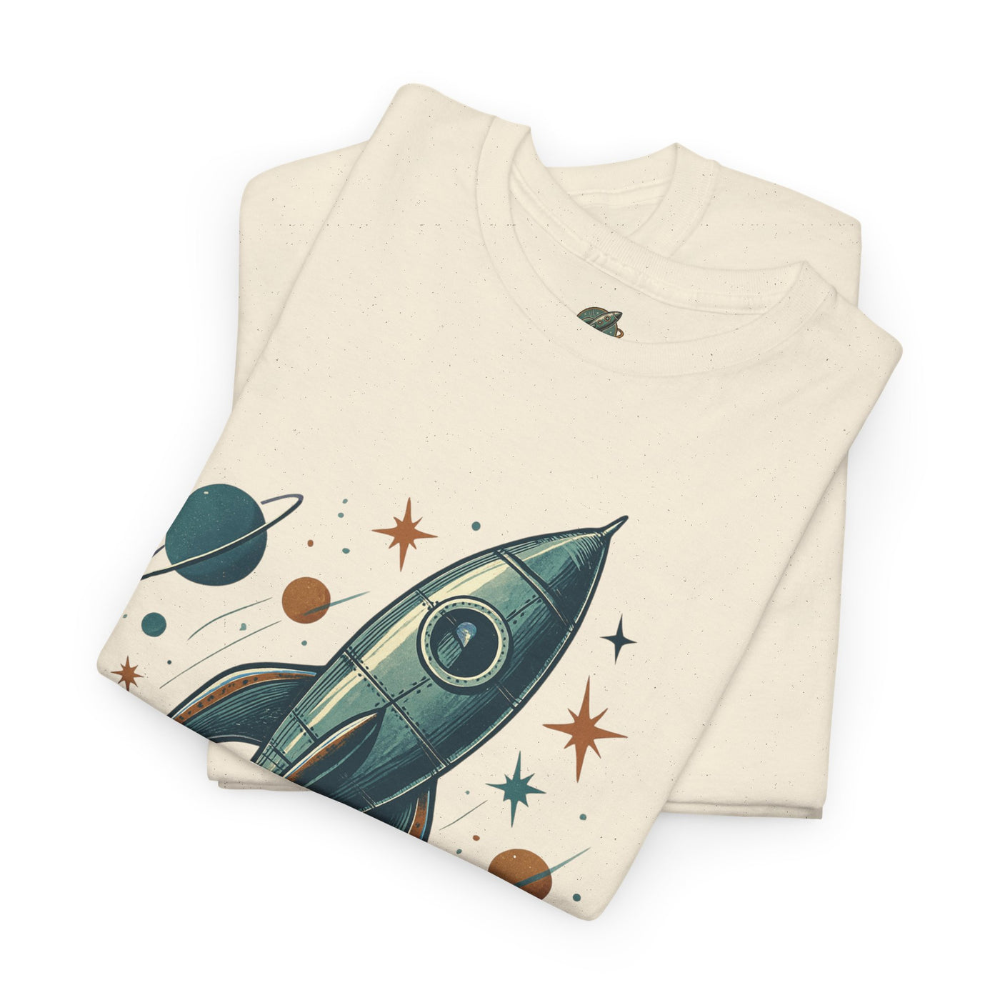 Folded t-shirt with space-themed design on a white background
